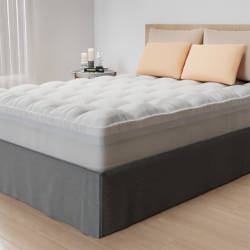 Surmatelas Dochair Hybride 10 cm, combinant mousse à mémoire de forme et un surconfort matelassé pour un équilibre parfait entre souplesse et maintien ergonomique.